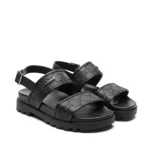 Gucci GG Embossed Leather Platform Sandals.